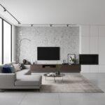 Modern living room with peel and stick wall tile behind TV and fireplace, creating a sleek, stylish, and easy-to-install feat.