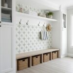 Wall tile with geometric pattern in beige, white, and light green.