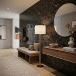 Black geometric textured wall tile with gold accents, in a contemporary living room setting.