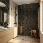 Black marble shower wall with gold accents and textured surface.