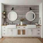 Double bathroom vanity with round mirrors and glass backsplash tiles.
