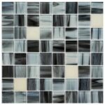 Glass tile backsplash, mosaic tiles, and pool tiles in shades of black, gray, and cream.