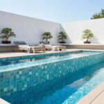 Poolside glass mosaic tile for modern outdoor pool decor, featuring a sleek and vibrant blue pattern.