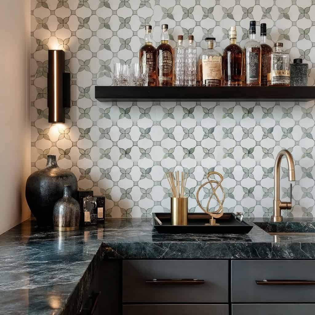 White and gray patterned tile wall with a glossy finish, complementing black countertops and gold accents for a contemporary.
