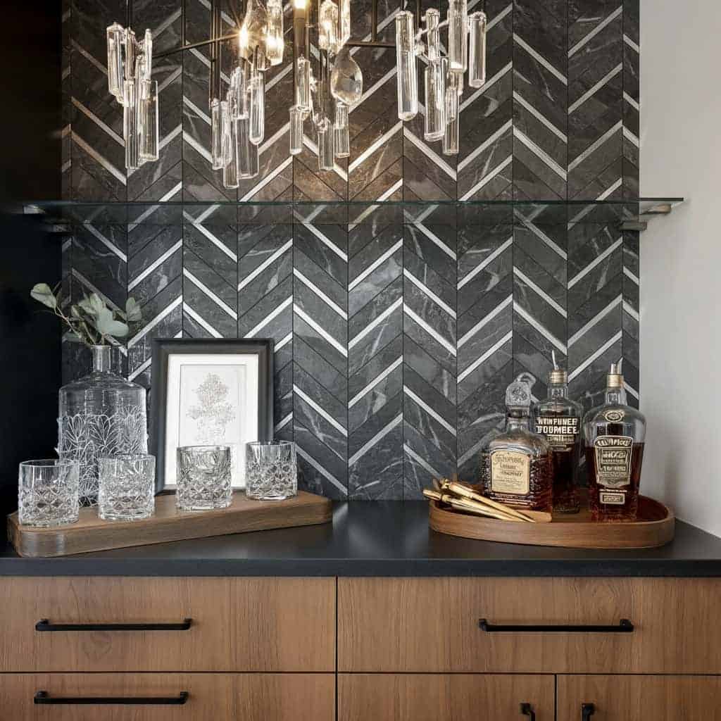 Black and gray peel and stick wall tile in a herringbone pattern behind a bar area.