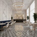 Luxurious black and white marble tile with geometric pattern, smooth texture, in a modern upscale restaurant setting.
