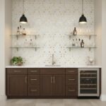 Mother of pearl shell tile backsplash with gold accents in a modern kitchen setting.