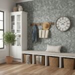 Modern interior with peel and stick wall tile, clock, and storage bench in a bright, stylish living space.