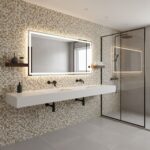 Modern bathroom with peel and stick tile wall and glass shower enclosure.