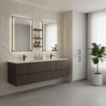 Two illuminated mirrors above a modern bathroom vanity with peel and stick tile backsplash.