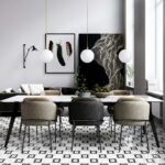 Black and white patterned ceramic tiles with a geometric design, complementing the contemporary decor and natural light in th.