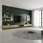 Modern living room with peel and stick wall tile, flat-screen TV, and minimalist decor. Bright space with natural light and s.