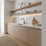 Up of a modern kitchen backsplash featuring mother of pearl shell tiles with a minimalist design.