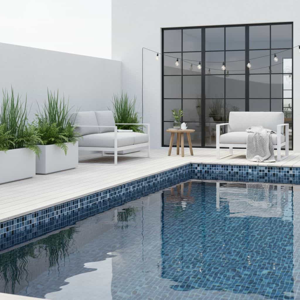 Glass tile backsplash, pool tile, modern outdoor decor, sleek poolside mosaic, stylish backyard tile.