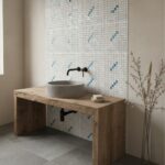 Bathroom with seashell tile backsplash and rustic wooden vanity.