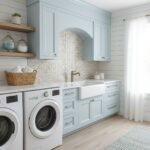 Mother of pearl shell tile backsplash in a bright, airy kitchen with light blue cabinets and white accents.