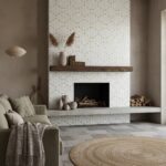 A stylish fireplace with a mother of pearl shell tile accent wall, adding a touch of elegance and natural beauty to the livin.