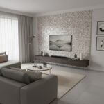 Modern living room with a feature wall made of mother of pearl shell tiles, adding a luxurious touch to the space.