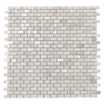 White shell tile wall with mother of pearl accents, perfect for stylish interior design.