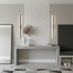 Modern interior with shell tile wall, decorative vase, and minimalistic design elements.