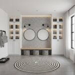 Stylish entryway featuring peel and stick wall tile, round mirrors, and built-in cabinets for a sleek, contemporary look.