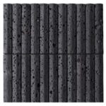 Dark gray concrete tile with a rough, porous texture and vertical grooves.