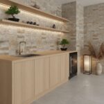 Beige stone-textured tiles with a rough surface, used on kitchen walls for a natural, rustic look.