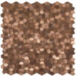 Close-up of a wooden peel and stick tile wall with hexagon shapes in various shades of brown.
