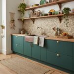Bright teal peel and stick tile backsplash in a modern kitchen.