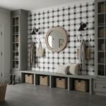 Black and white checkered tile with textured surface, used as a decorative wall feature in a modern entryway.