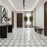 Black and white geometric patterned ceramic tile with a glossy finish.