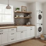 Bright laundry room featuring glass mosaic tile backsplash, white cabinetry, and stacked washer and dryer.