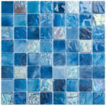 Vibrant blue glass tile mosaic featuring iridescent and textured surfaces, ideal for backsplashes, pools, and decorative acce.