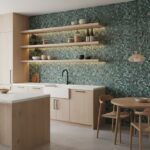 A modern kitchen featuring peel and stick tile backsplash with a textured, mosaic design, complemented by light wood cabinetr.
