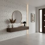 Mirror and wall decor with pearl shell tile accents in a modern entryway.