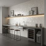 Modern kitchen with mother of pearl shell tile backsplash, bar stools, and minimalist decor.