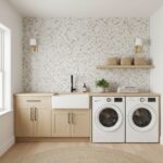 Bright laundry room featuring a glass tile backsplash, washer, dryer, and natural light. Modern and functional design with ne.