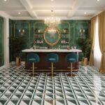 Elegant green marble tiles with gold accents and a sophisticated bar setup.
