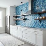 Blue peel and stick wall tile in modern kitchen backsplash.