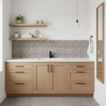 Modern kitchen with peel and stick tile backsplash, wooden cabinets, and minimal decor.