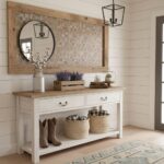 A cozy entryway with peel and stick tile backsplash, a mirror, and decorative accents. Perfect for modern home updates and ea.