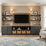 Modern living room with peel and stick wall tile behind TV and decorative shelves.