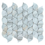 Peel and stick wall tile with a leaf-like design in soft blue and beige tones. Perfect for backsplash or wall accents in home.