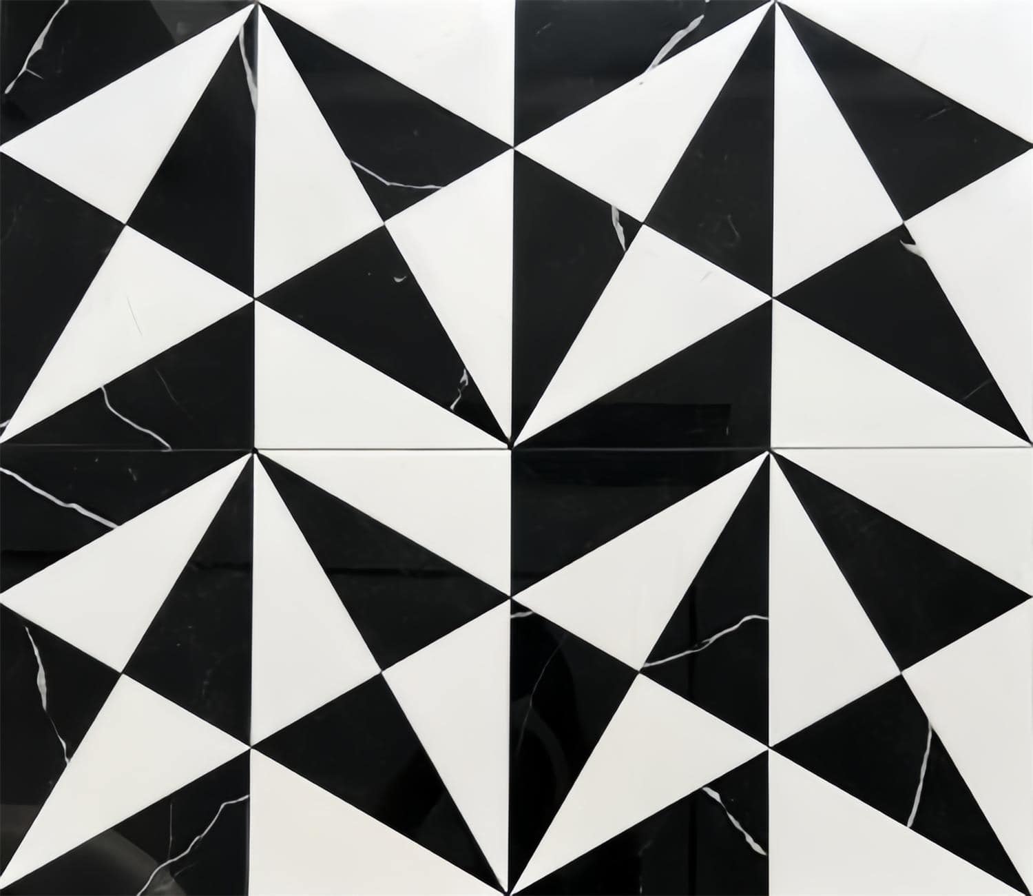 Black and white geometric patterned tile with marble veining, smooth texture, and modern design.