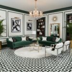Luxurious living room with emerald green velvet sofas, black and white geometric patterned tile floor, and sophisticated deco.