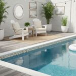 Pool with glass mosaic tile border and relaxing poolside lounge area.