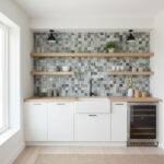 Modern kitchen with glass tile backsplash and open wooden shelves.