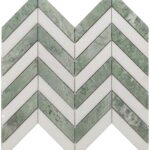 Green marble herringbone tile with textured surface and polished finish.