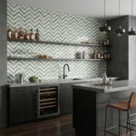 Chevron patterned tile in shades of green and white, with a matte finish and textured surface.