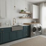 Bright blue kitchen cabinets with a farmhouse sink and gold hardware, white wall tiles, and open wooden shelves.